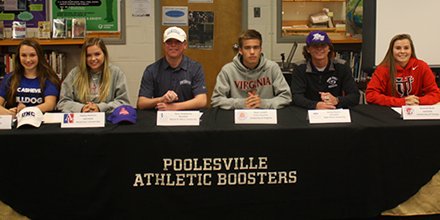 Student signees pose in their colleges gear. Photo: Twitter/@PHSathletics