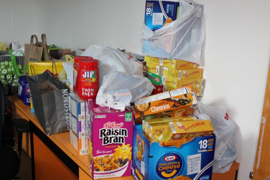 Donations pile up at the Humanities collection site. Photo courtesy of the Poolesville Pulse. 