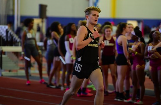 Senior Sam Bodmer runs the 3200 race at the 2A Indoor Track state meet on Feb. 17, 2020. 