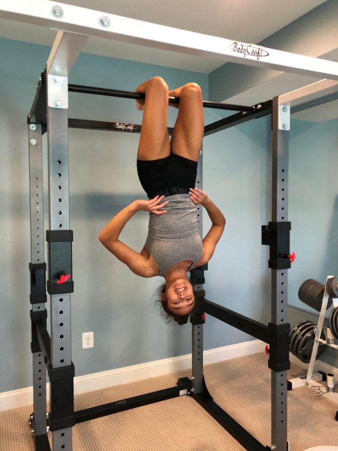 Sophomore gymnast Maia Lee hangs in there to keep up her training during COVID-19. 
