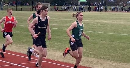Billy Beane (23) runs his leg of the record-breaking boys 4 by 1600 meter relay