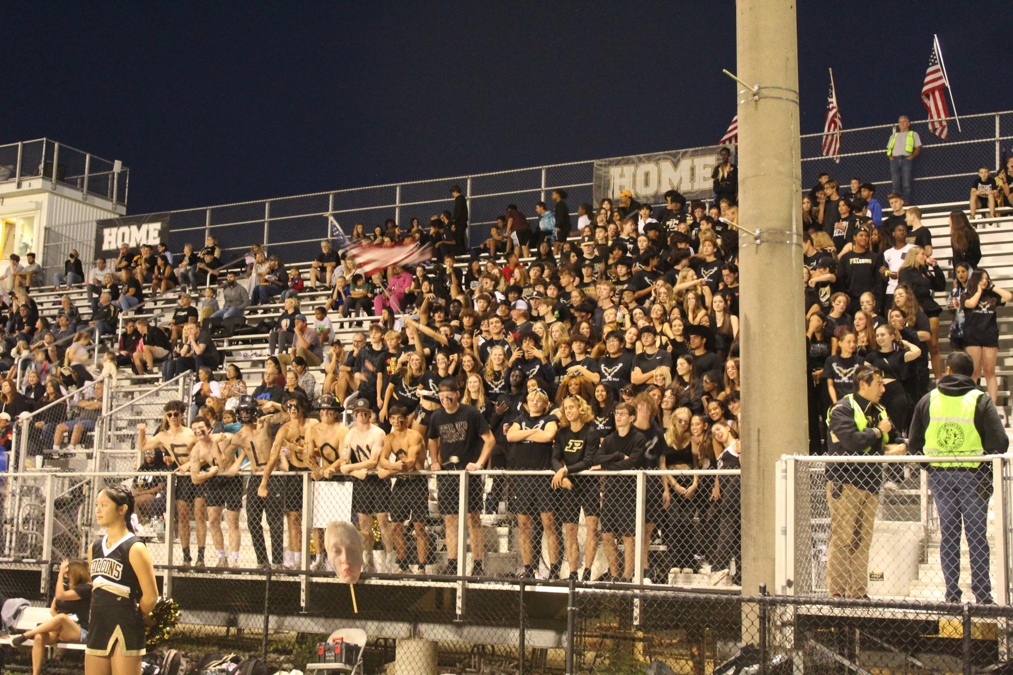 The poolesville student section as they hype up the team to their first touchdown of the season.