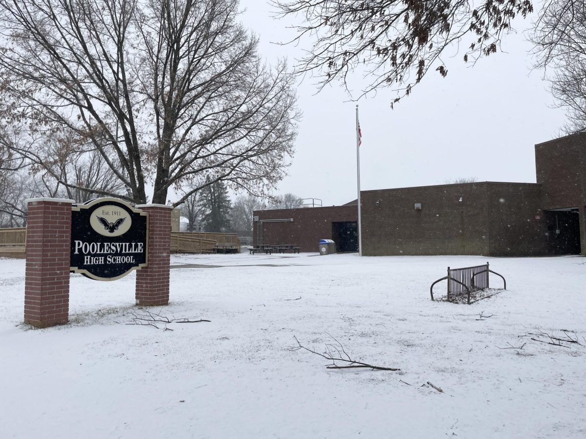 Snow covers the school grounds, creating a five day weekend for students.