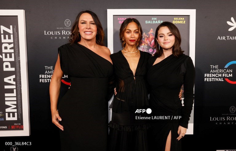 (L-R) Actresses Karla Sofia Gascon, Zoe Saldana, Selena Gomez attend the screening of "Emilia Perez" on opening night of The American French Film Festival (TAFFF) at the Directors Guild of America (DGA) in Los Angeles, October 29, 2024. (Photo by Etienne LAURENT / AFP)