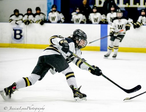 Adeline Vederman playing hockey