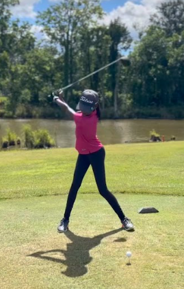 Myra Pone playing golf