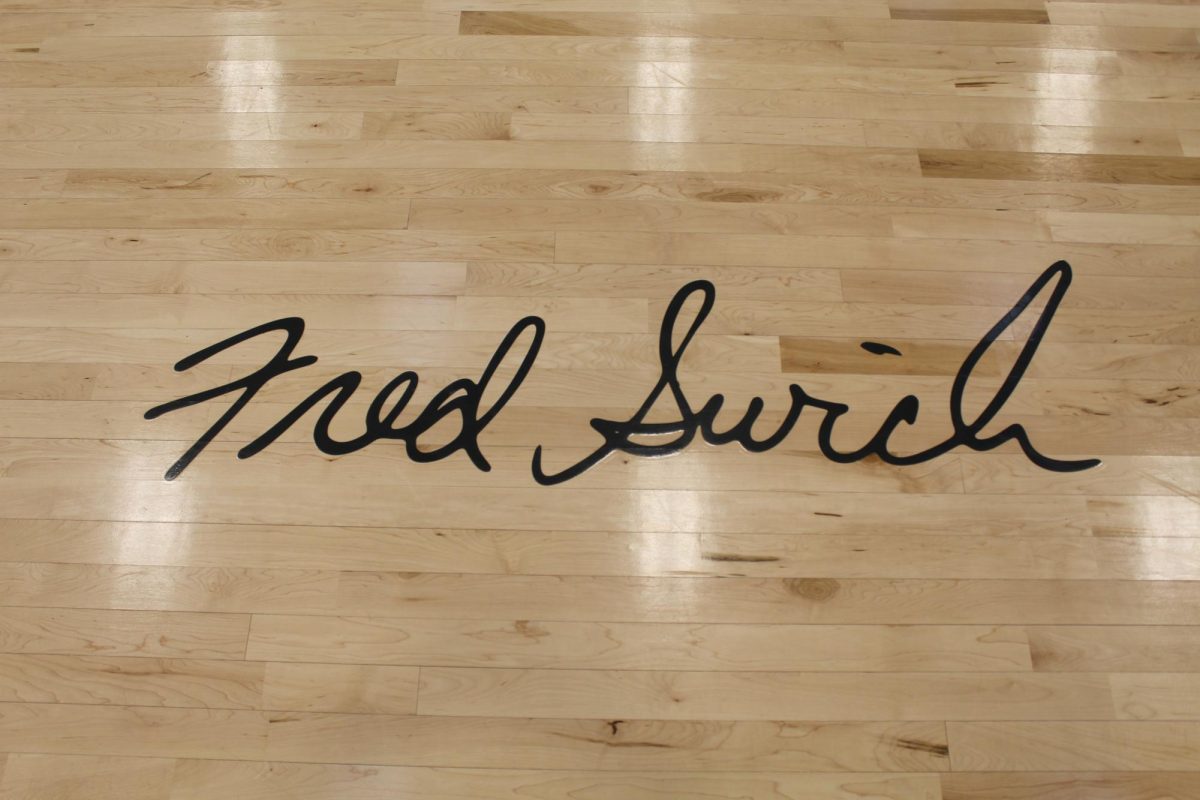 Fred Swick's signature on the floor of the PHS main gym