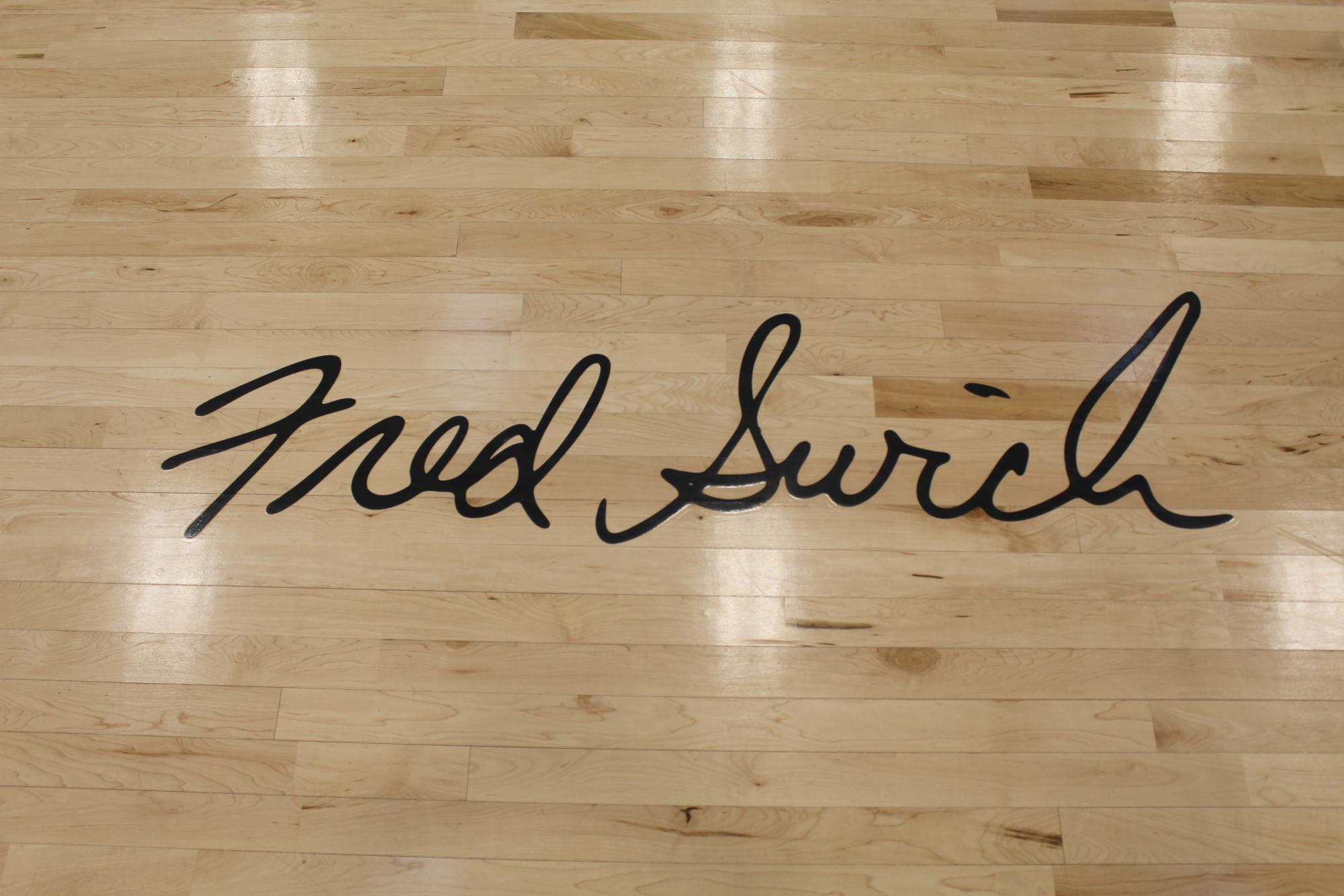 Fred Swick's signature on the floor of the PHS main gym