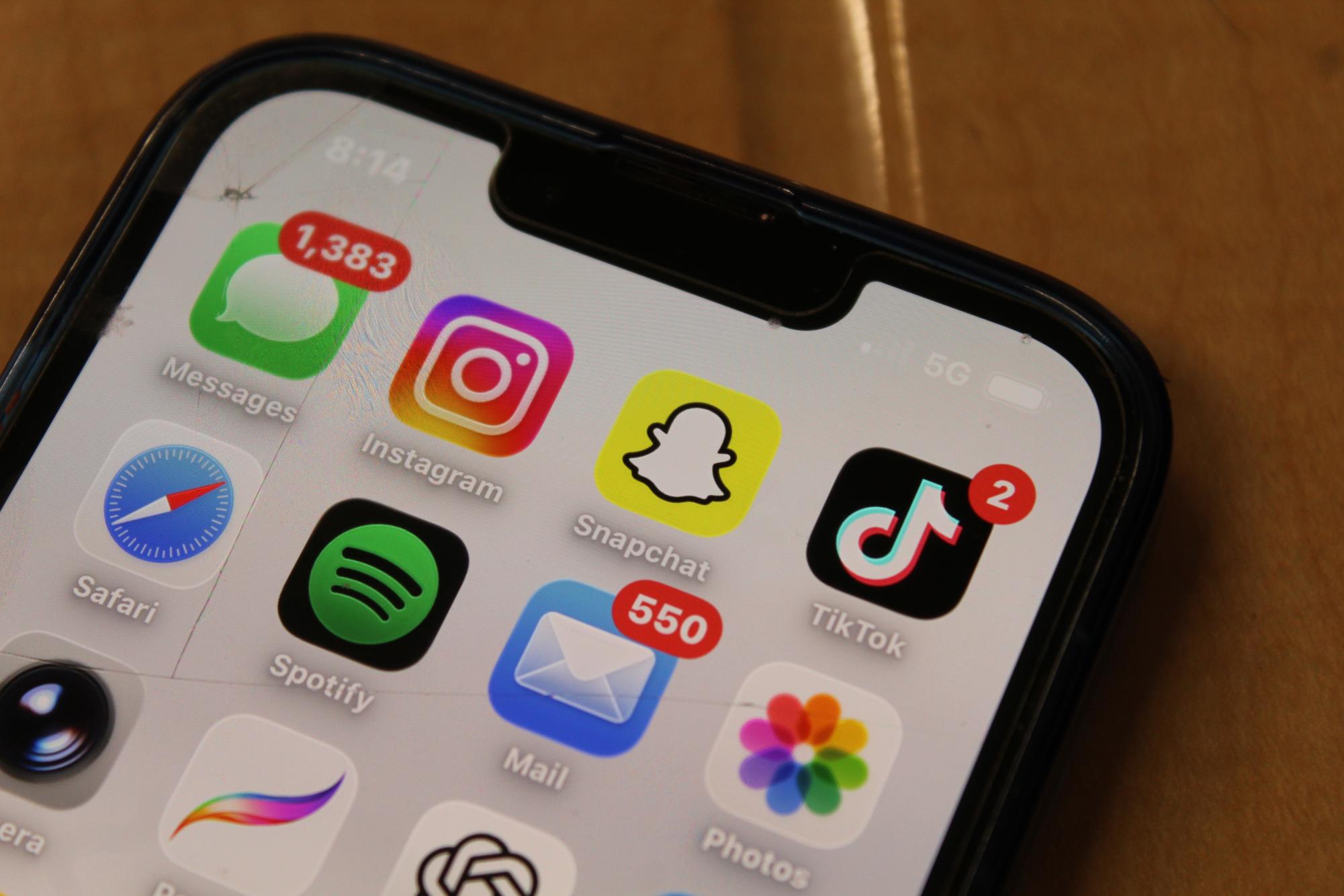 Phone displaying Snapchat app logo