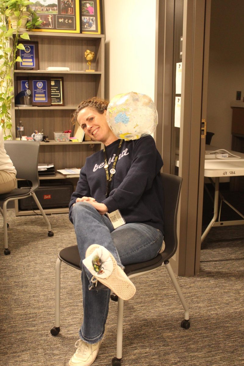 Magnet Coordinator Miss Allison Wilder created her costume "On The Fly" while "Balancing The World On Her Shoulder."